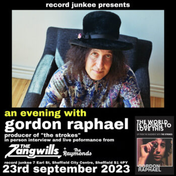 The Zangwills with Gordon Raphael. Gordon Raphale sat in a chair with a top hat.
